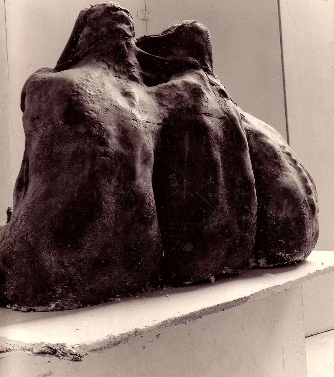 Reverse view of three female seated figures