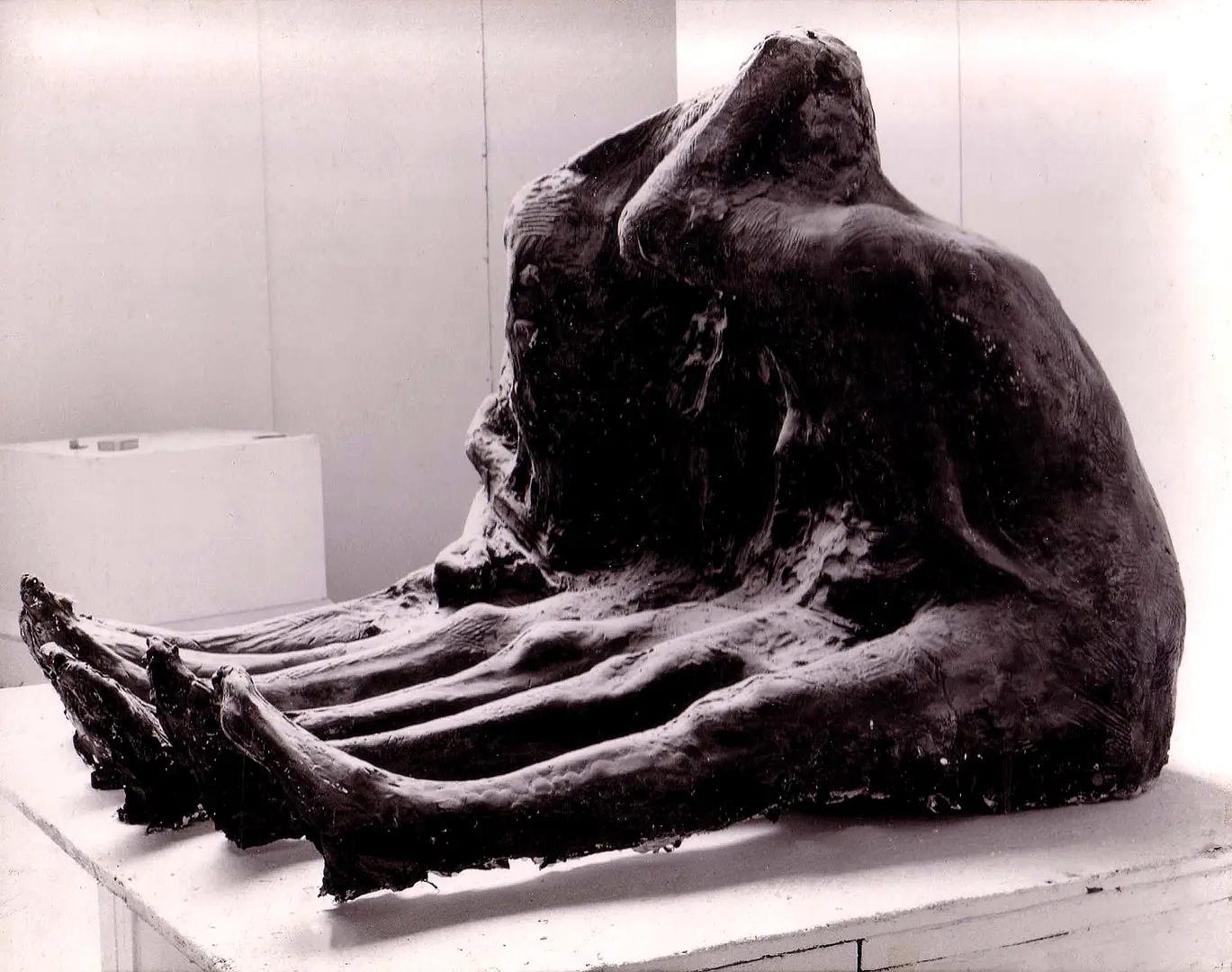 Three female seated figures