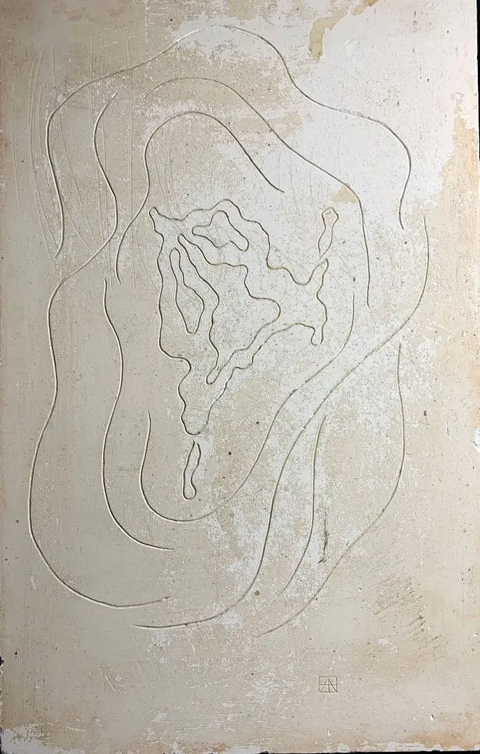 Two swimmers in relief in plaster