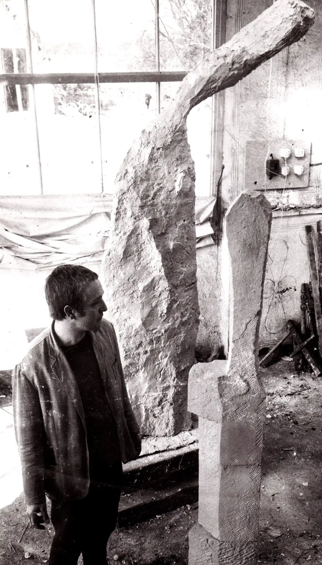 Roy Noakes in the studio with sculptures at GT. Sampford, Essex