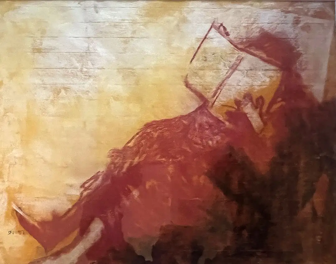 A chalk drawing of a sitting woman reading