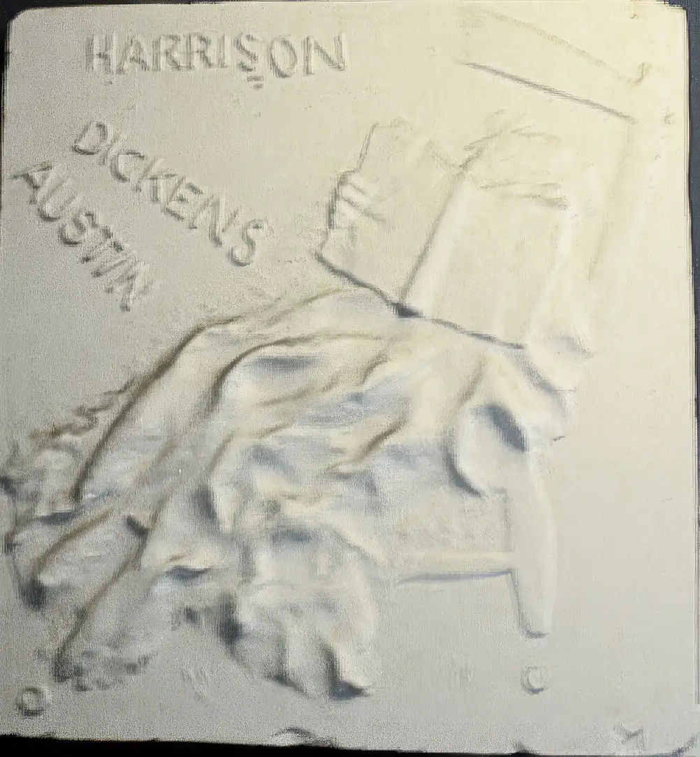 A relief of a woman reading with the words Harrison, Austin and Dickens, cast in plaster