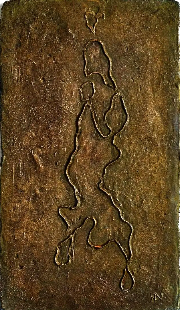 A relief of a swimmer cast in bronze