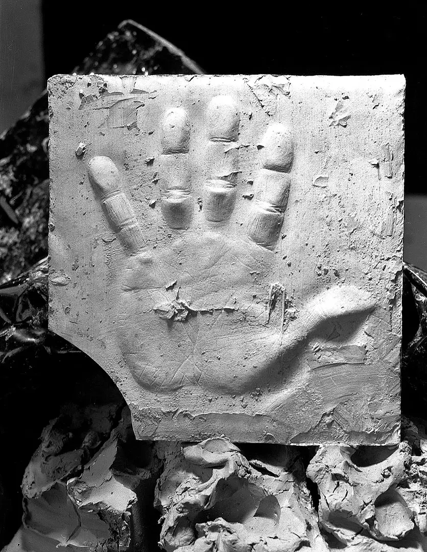 Roy Noakes hand impression set on a base of raw clay